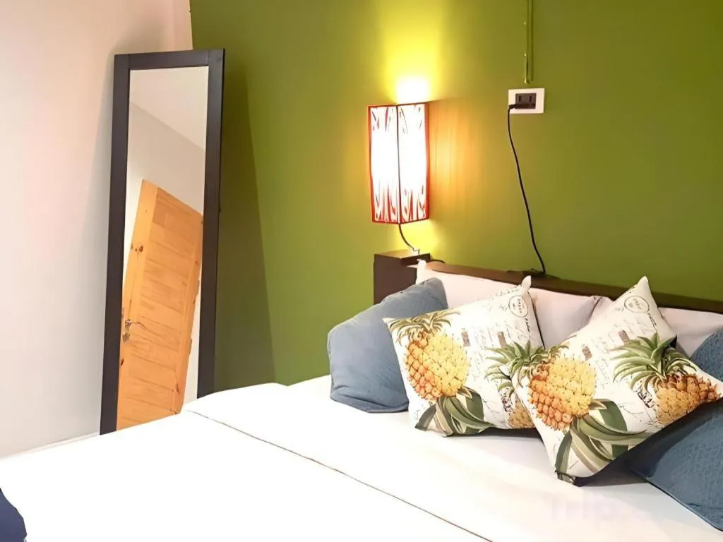 Bed in The Color Express Hotel