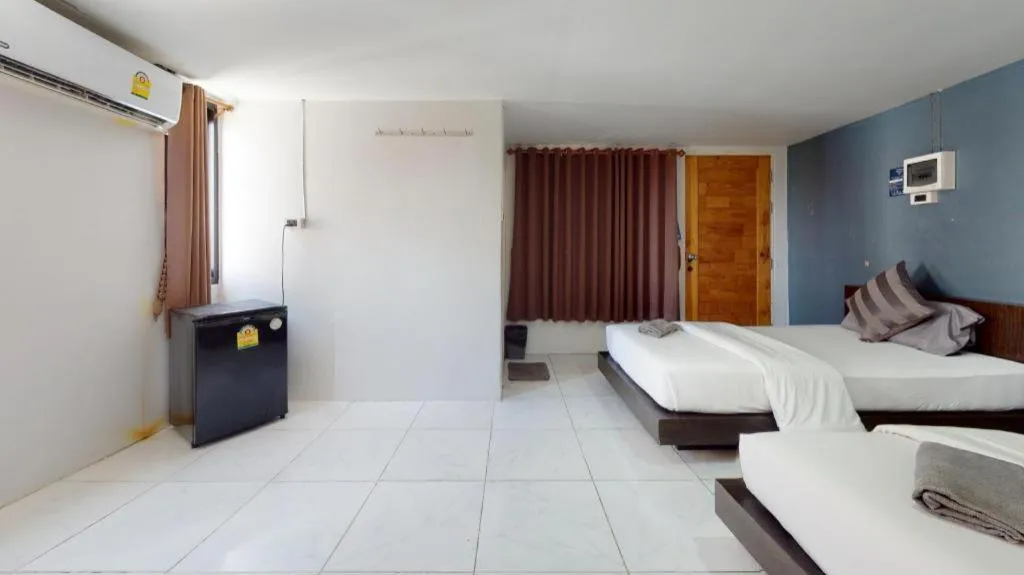 Bed in The Color Express Hotel