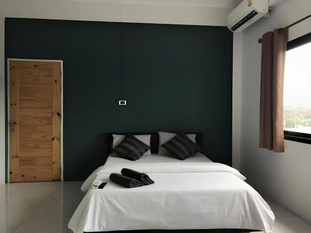 Bed in The Color Express Hotel