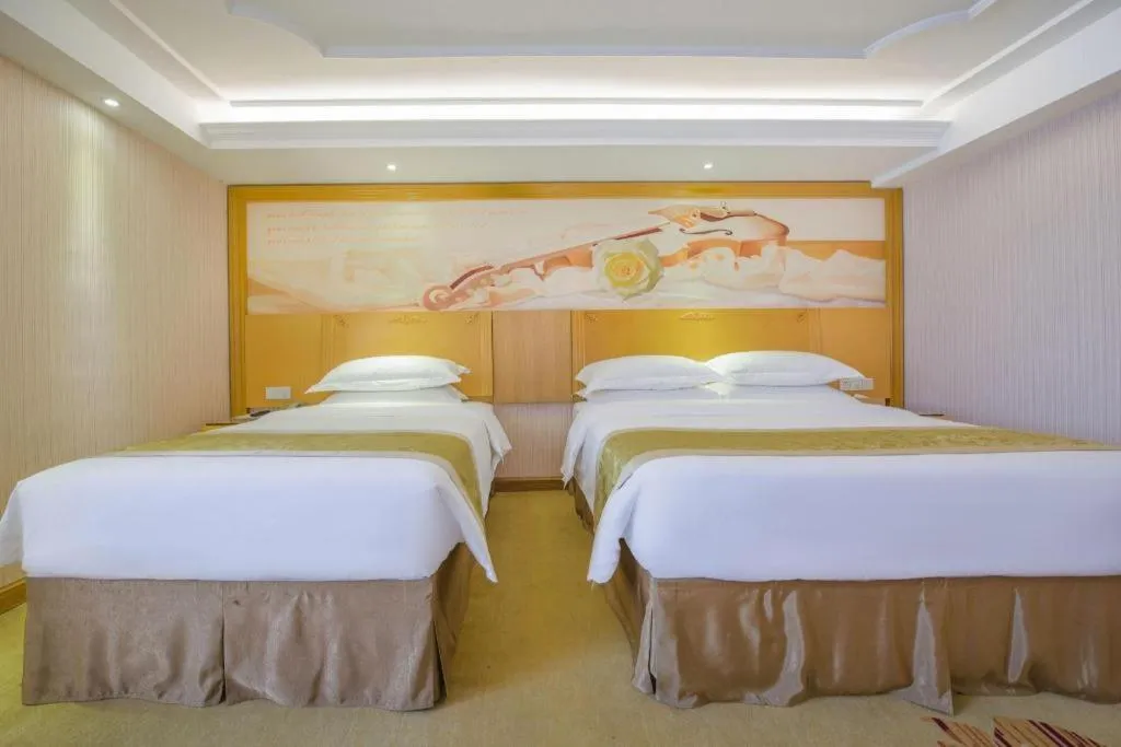Bed in Vienna Hotel Guangzhou Panyu Shiqiao Center Branch