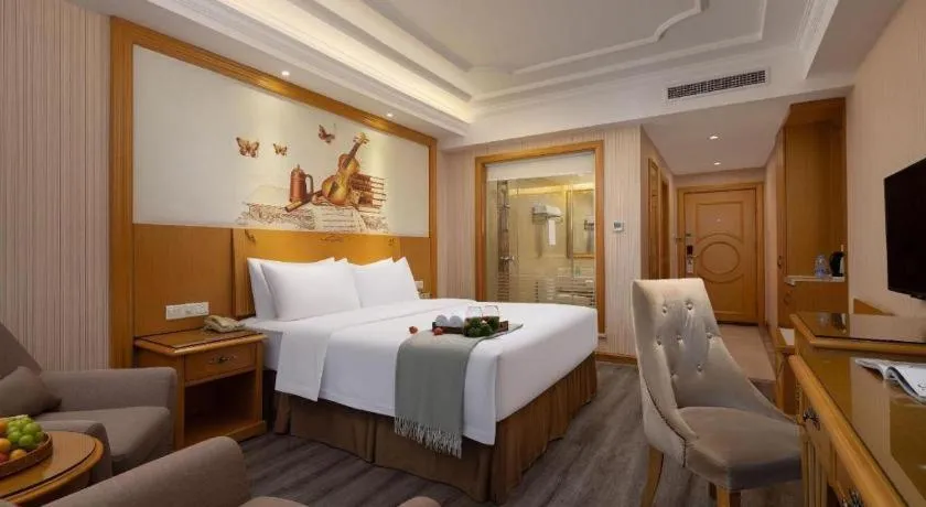 Bed in Vienna Hotel Guangzhou Panyu Shiqiao Center Branch