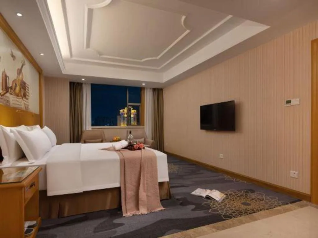 Bed in Vienna Hotel Guangzhou Panyu Shiqiao Center Branch
