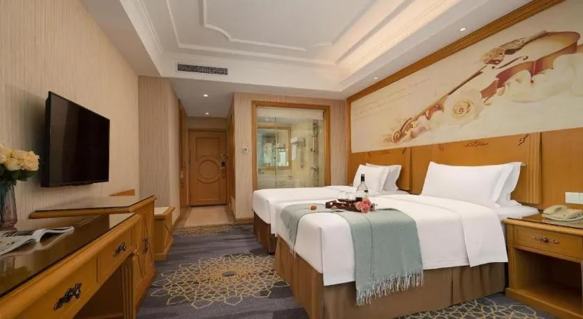 Bed in Vienna Hotel Guangzhou Panyu Shiqiao Center Branch