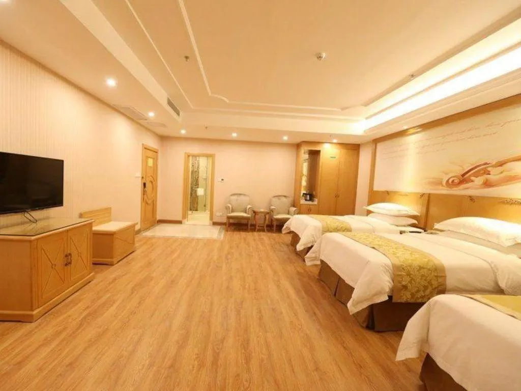 Bed in Vienna Hotel Guangzhou Panyu Shiqiao Center Branch