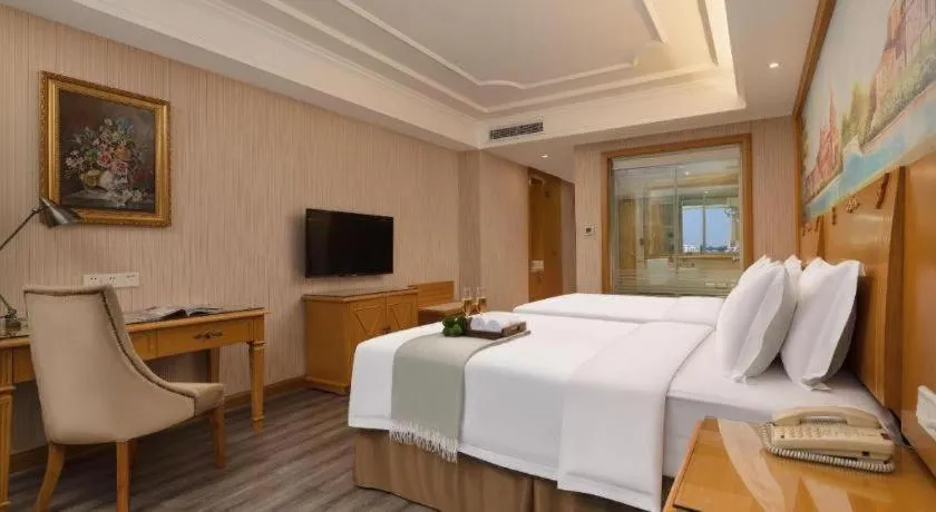 Bed in Vienna Hotel Guangzhou Panyu Shiqiao Center Branch