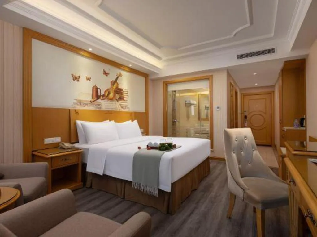 Bed in Vienna Hotel Guangzhou Panyu Shiqiao Center Branch