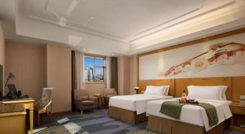 Bed in Vienna Hotel Guangzhou Panyu Shiqiao Center Branch