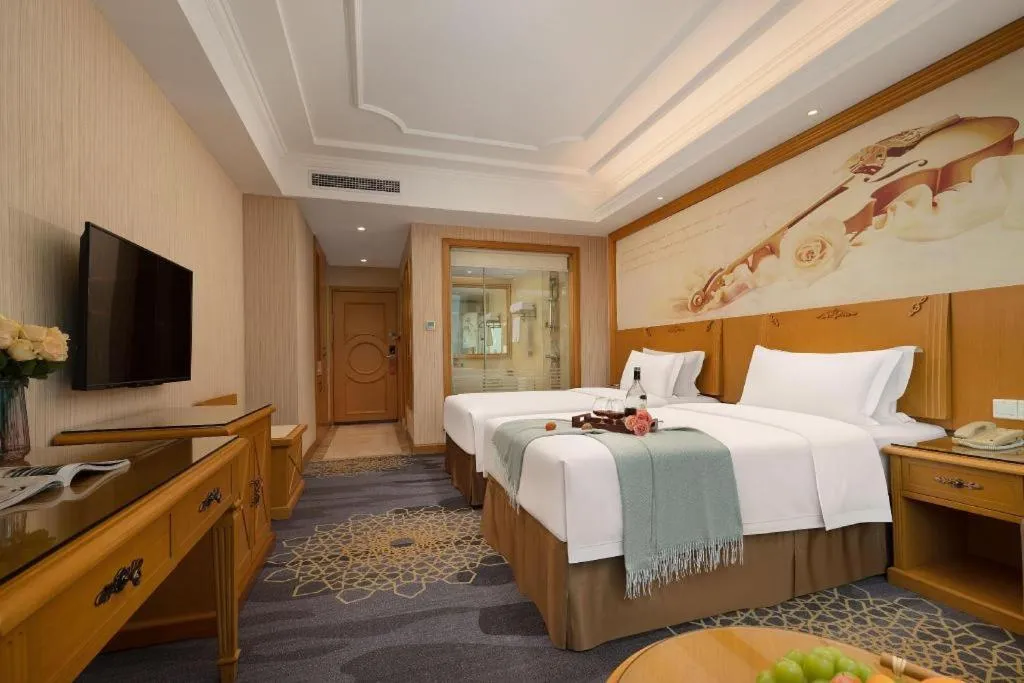 Bed in Vienna Hotel Guangzhou Panyu Shiqiao Center Branch
