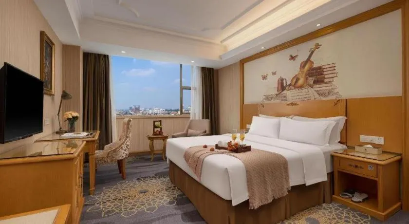 Bed in Vienna Hotel Guangzhou Panyu Shiqiao Center Branch
