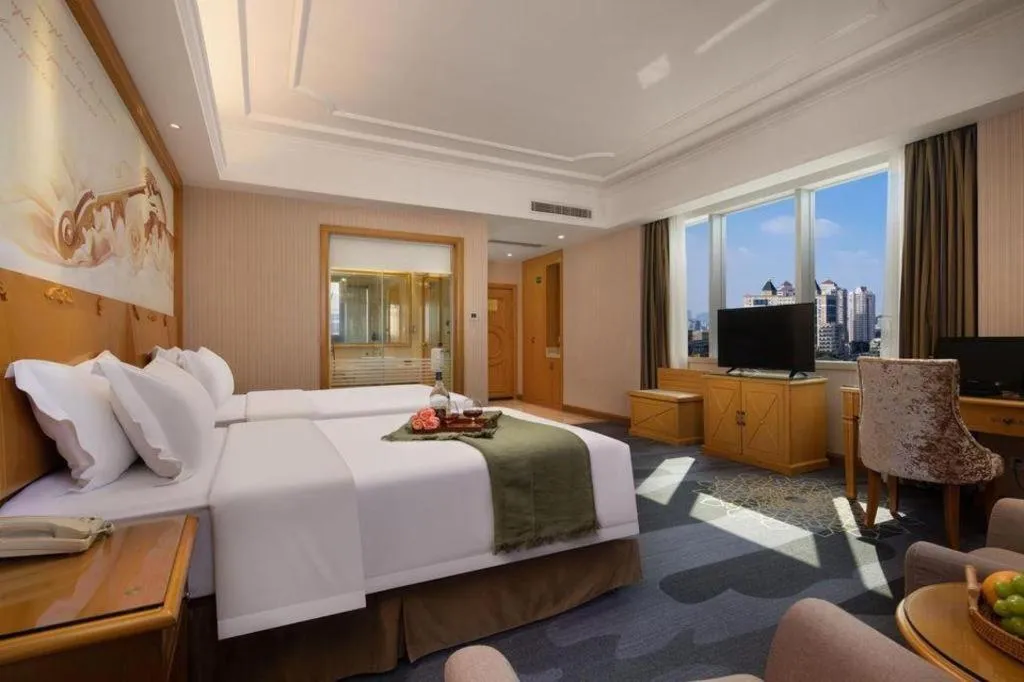 Bed in Vienna Hotel Guangzhou Panyu Shiqiao Center Branch