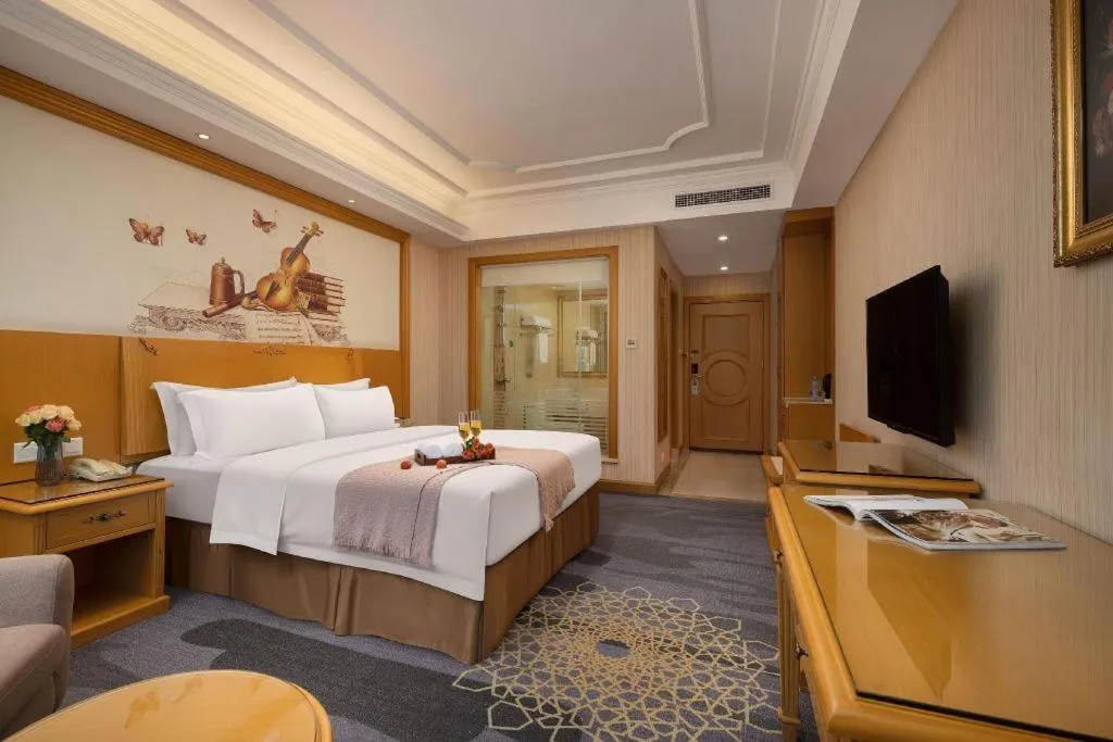 Bed in Vienna Hotel Guangzhou Panyu Shiqiao Center Branch