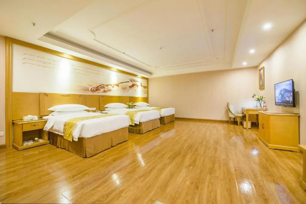 Bed in Vienna Hotel Guangzhou Panyu Shiqiao Center Branch
