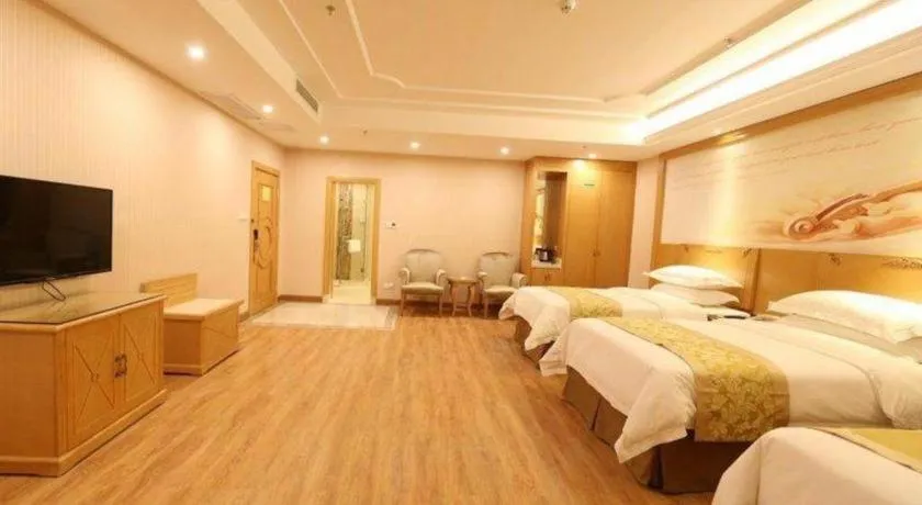 Bed in Vienna Hotel Guangzhou Panyu Shiqiao Center Branch