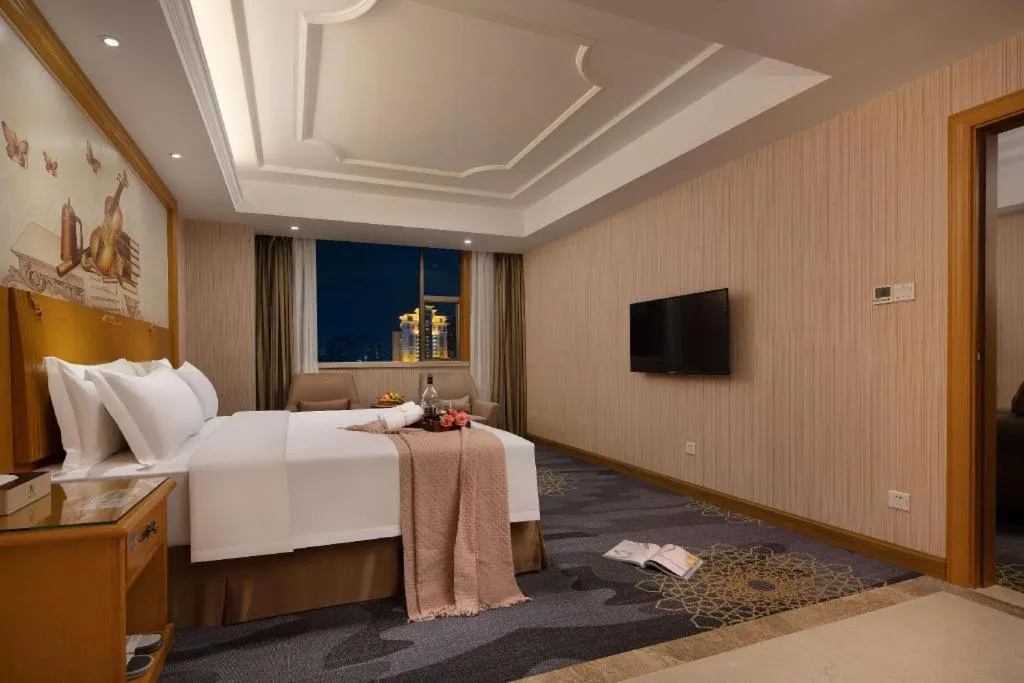 Bed in Vienna Hotel Guangzhou Panyu Shiqiao Center Branch