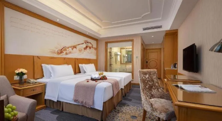 Bed in Vienna Hotel Guangzhou Panyu Shiqiao Center Branch