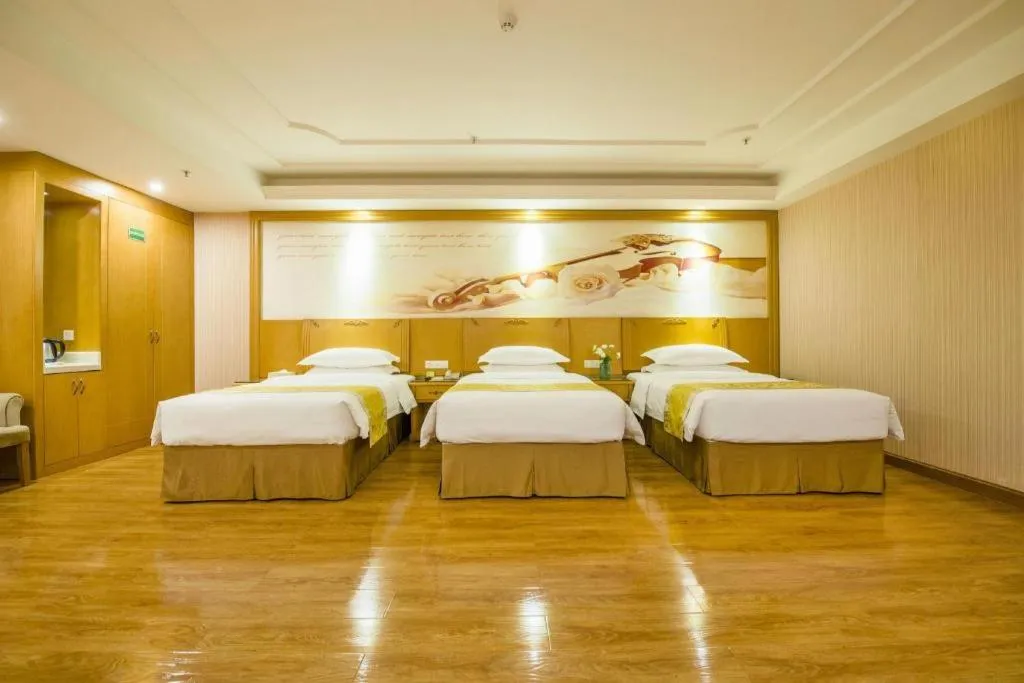 Bed in Vienna Hotel Guangzhou Panyu Shiqiao Center Branch