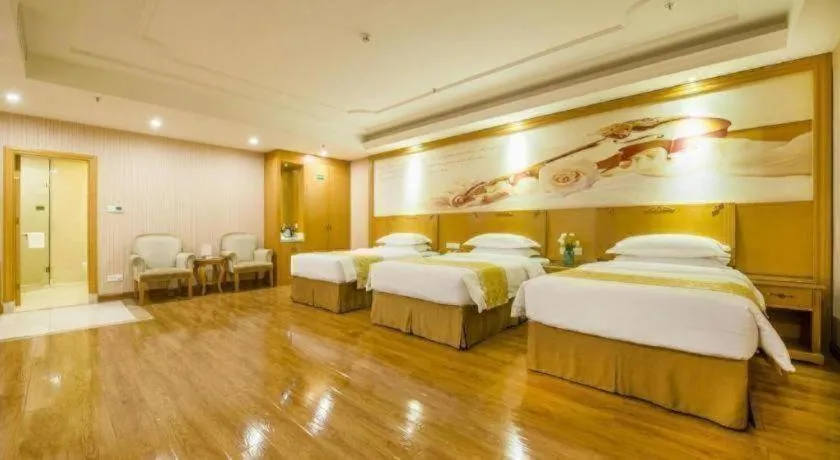 Bed in Vienna Hotel Guangzhou Panyu Shiqiao Center Branch