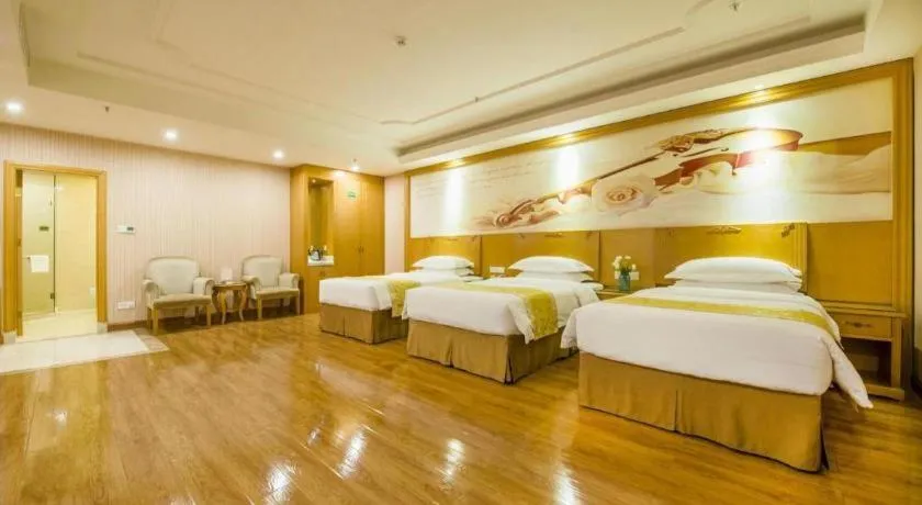 Bed in Vienna Hotel Guangzhou Panyu Shiqiao Center Branch