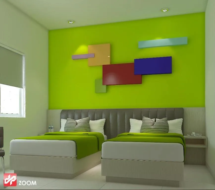 Bed in Zoom Dharmahusada Hotel