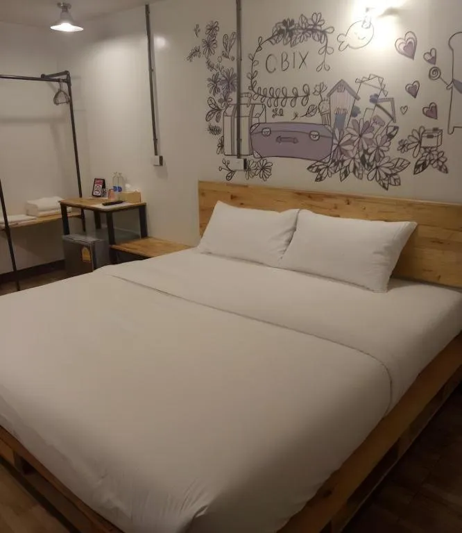 Bed in QBix Hotel