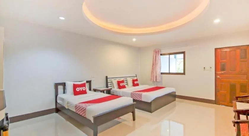 Bed in OYO 75310 Canalis Resort