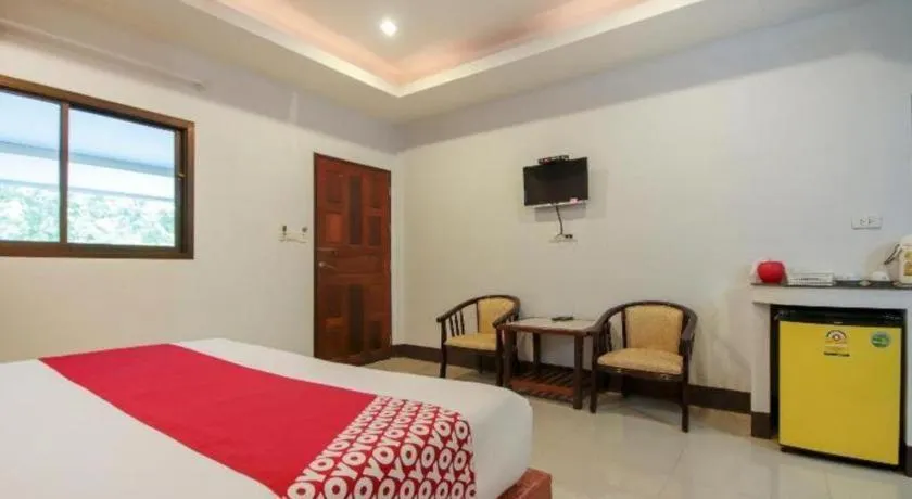 Bed in OYO 75310 Canalis Resort