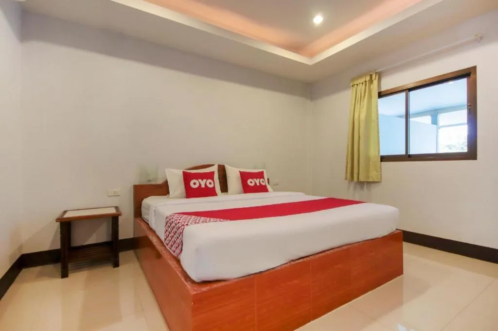 Bed in OYO 75310 Canalis Resort