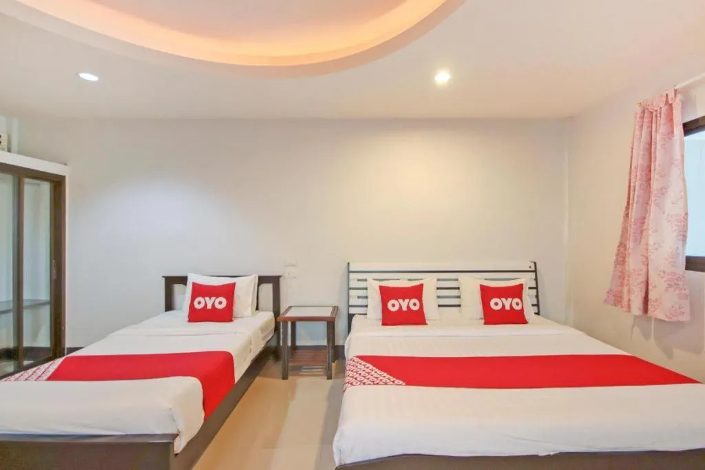 Bed in OYO 75310 Canalis Resort