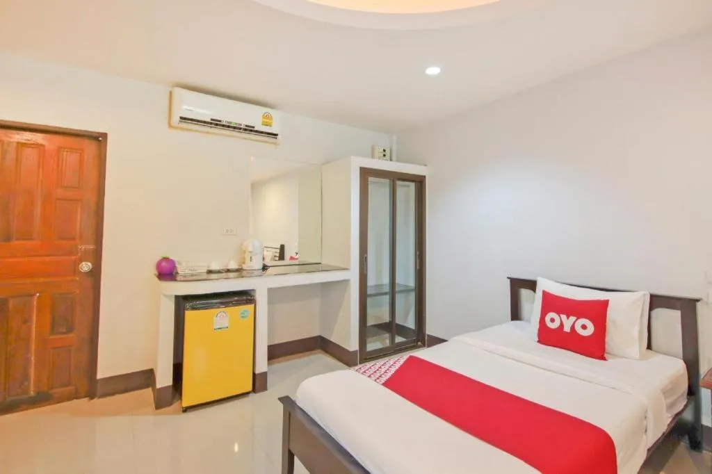 Bed in OYO 75310 Canalis Resort