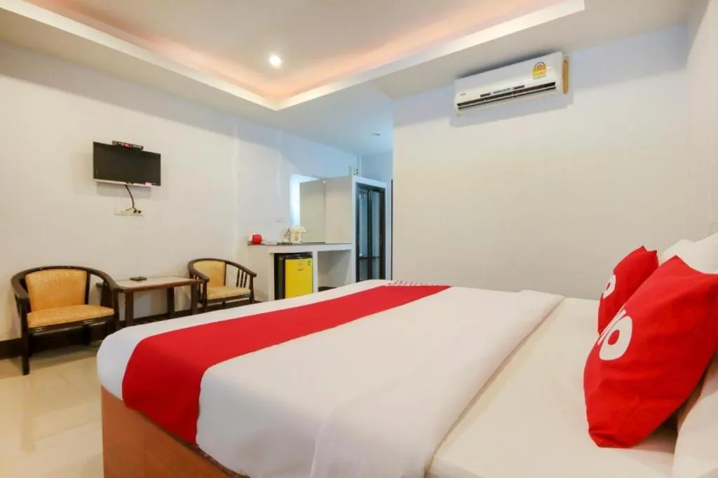 Bed in OYO 75310 Canalis Resort