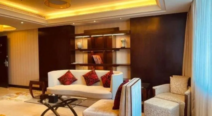 Bed in New Century Grand Hotel Lishui Huaqiao