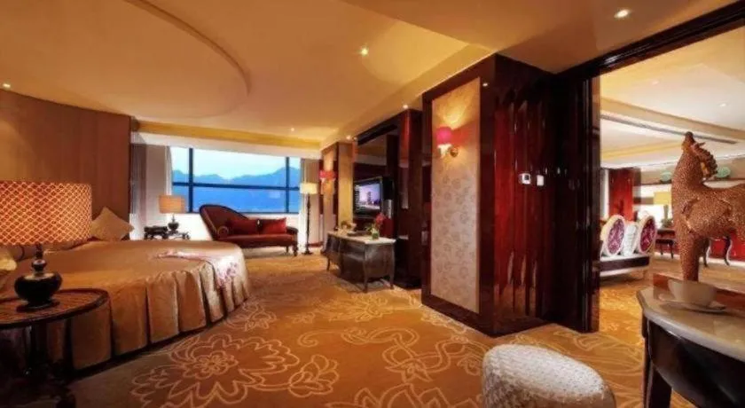 Bed in New Century Grand Hotel Lishui Huaqiao