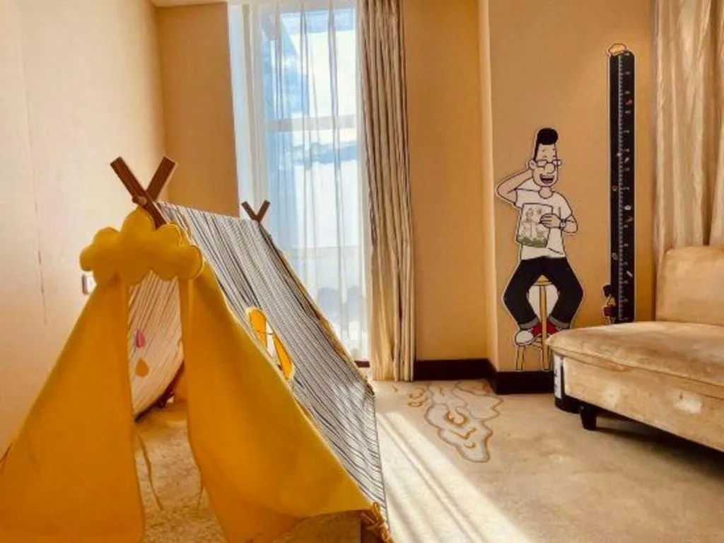 Bed in New Century Grand Hotel Lishui Huaqiao