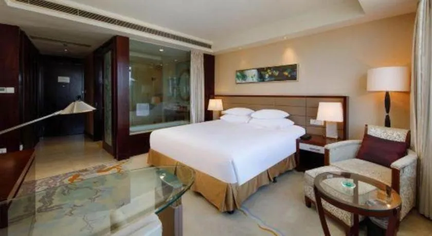 Bed in New Century Grand Hotel Lishui Huaqiao