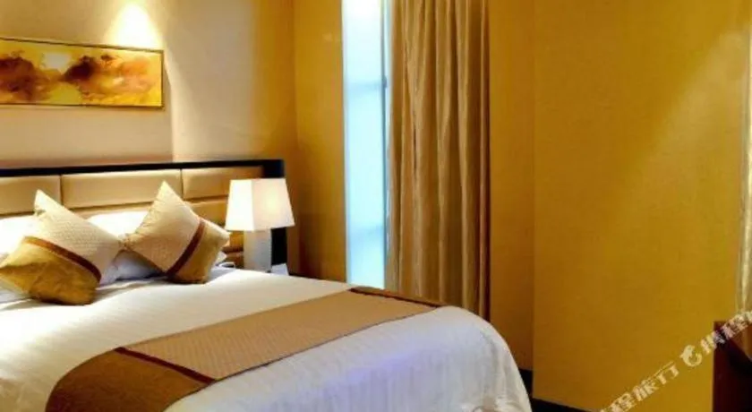 Bed in New Century Grand Hotel Lishui Huaqiao