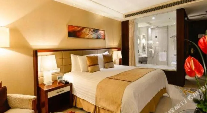 Bed in New Century Grand Hotel Lishui Huaqiao