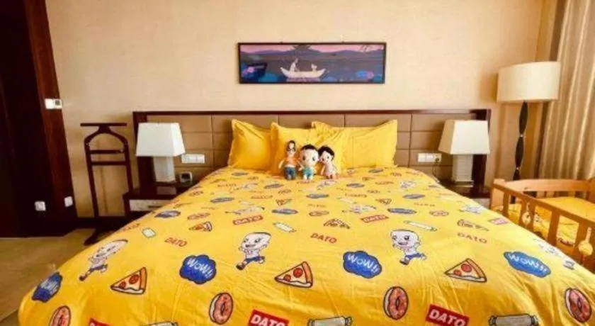 Bed in New Century Grand Hotel Lishui Huaqiao