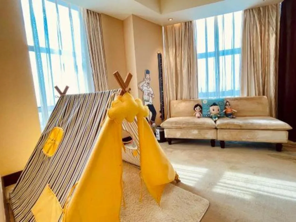 Bed in New Century Grand Hotel Lishui Huaqiao