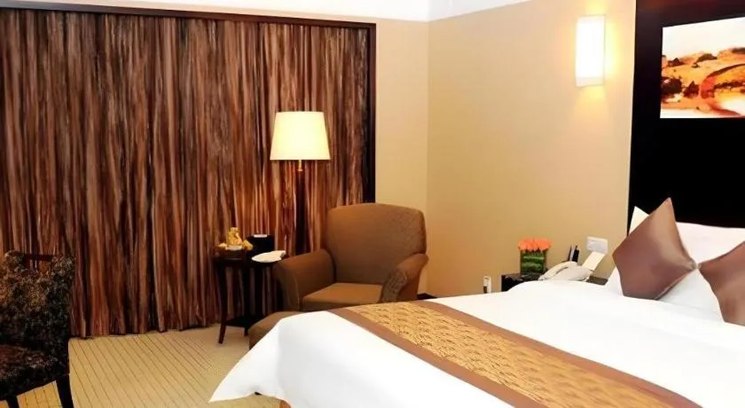 Bed in Qingdao Blue Horizon Hotel Laoshan