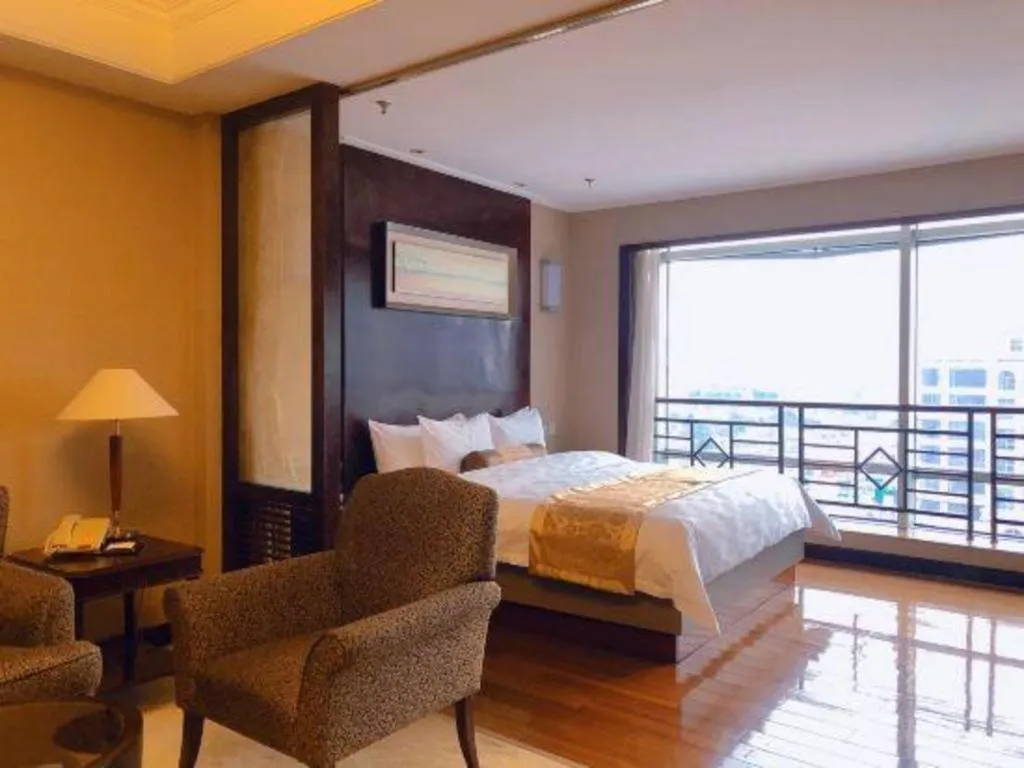 Bed in Qingdao Blue Horizon Hotel Laoshan