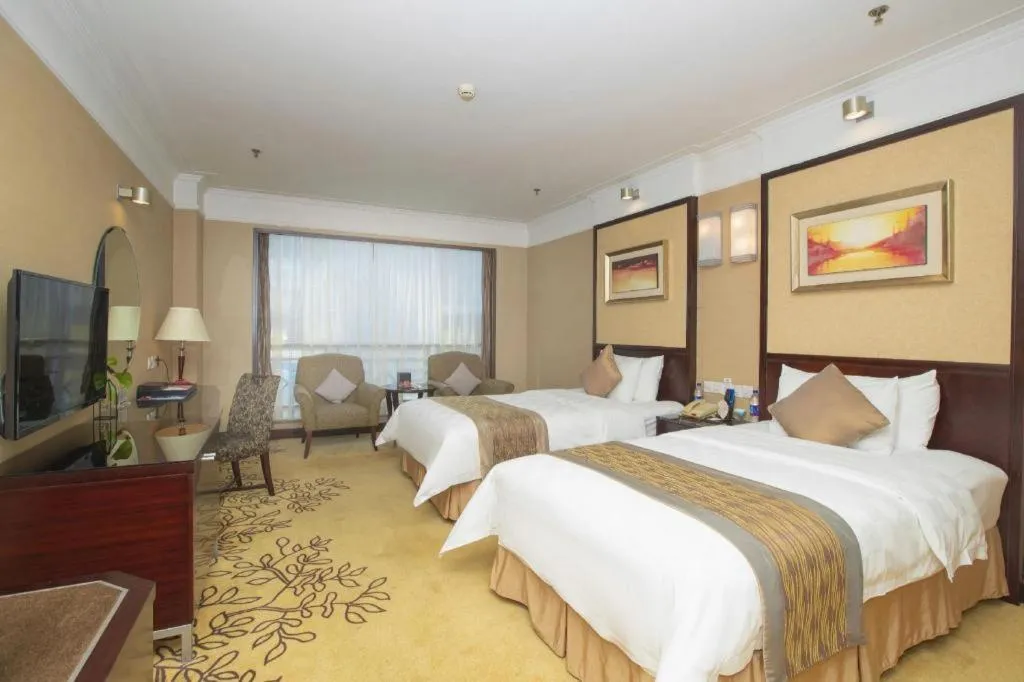 Bed in Qingdao Blue Horizon Hotel Laoshan