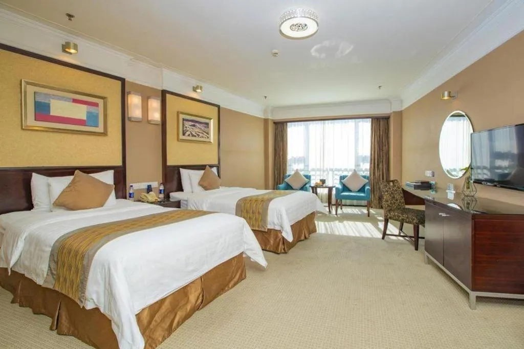 Bed in Qingdao Blue Horizon Hotel Laoshan