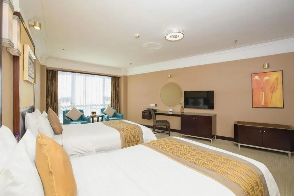 Bed in Qingdao Blue Horizon Hotel Laoshan