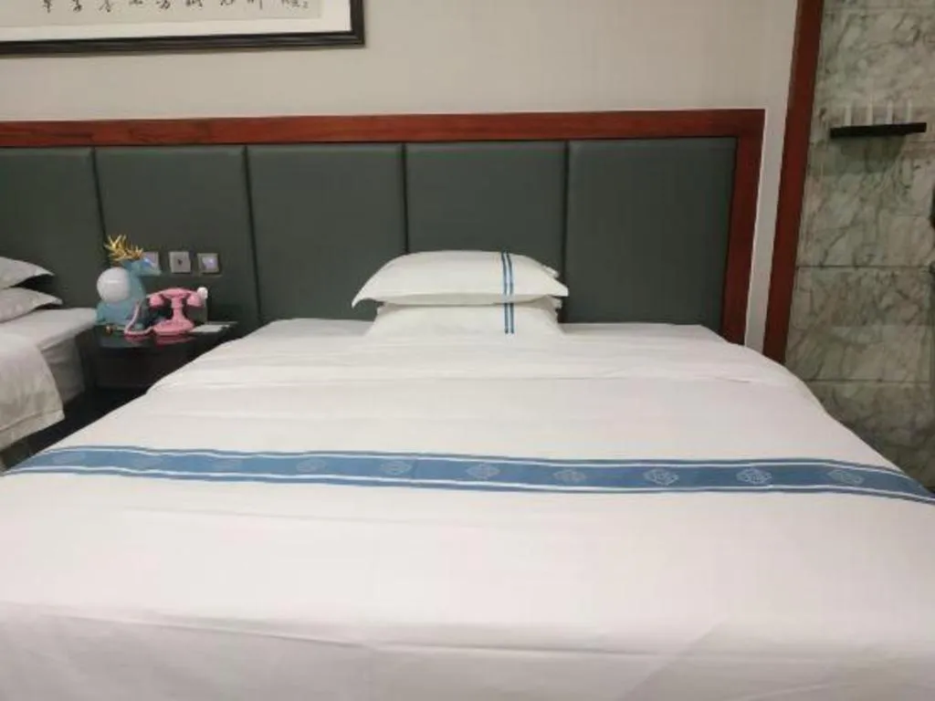 Bed in Chengdu Handu International Hotel