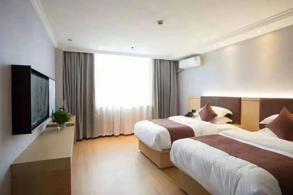 Bed in GYA Hotel Shanghai Songjiang Wanda Plaza