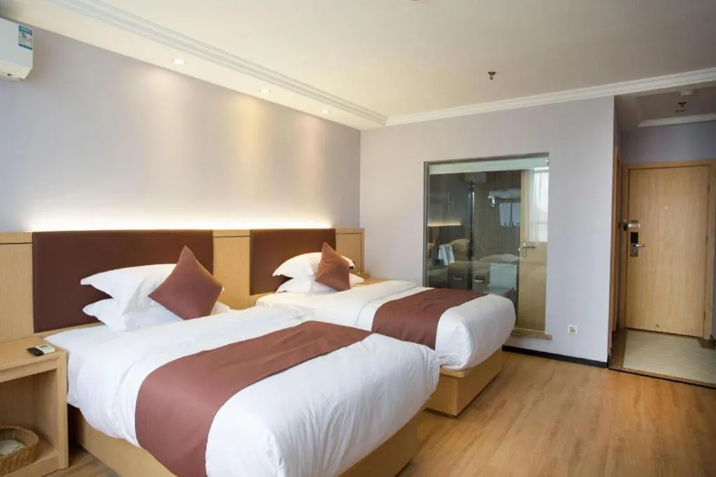 Bed in GYA Hotel Shanghai Songjiang Wanda Plaza