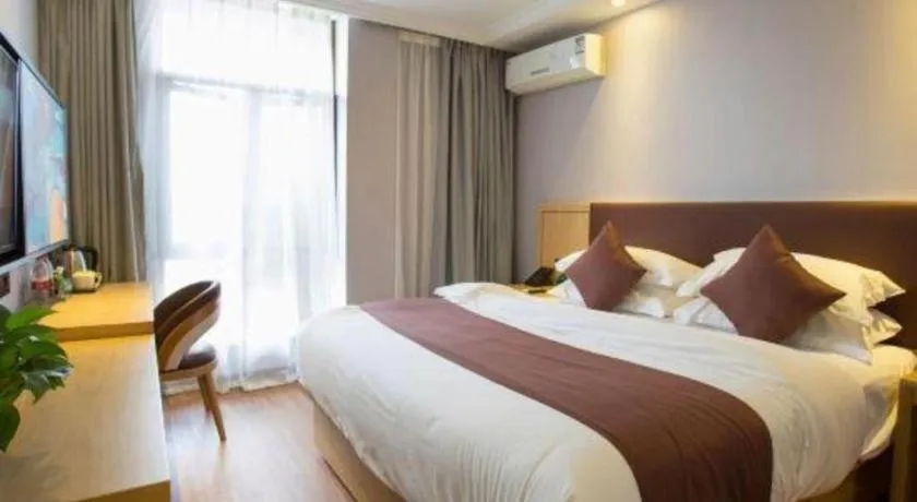 Bed in GYA Hotel Shanghai Songjiang Wanda Plaza