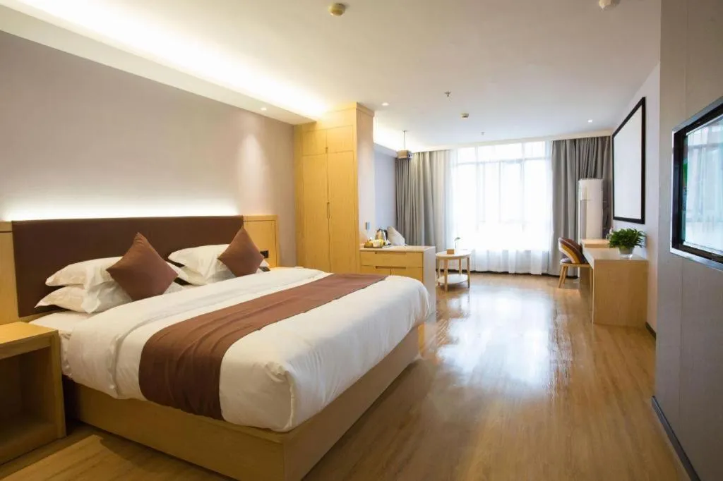 Bed in GYA Hotel Shanghai Songjiang Wanda Plaza
