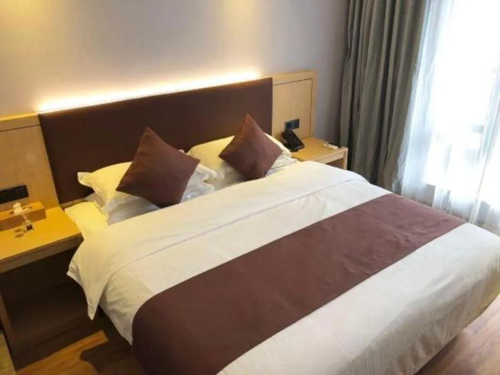 Bed in GYA Hotel Shanghai Songjiang Wanda Plaza