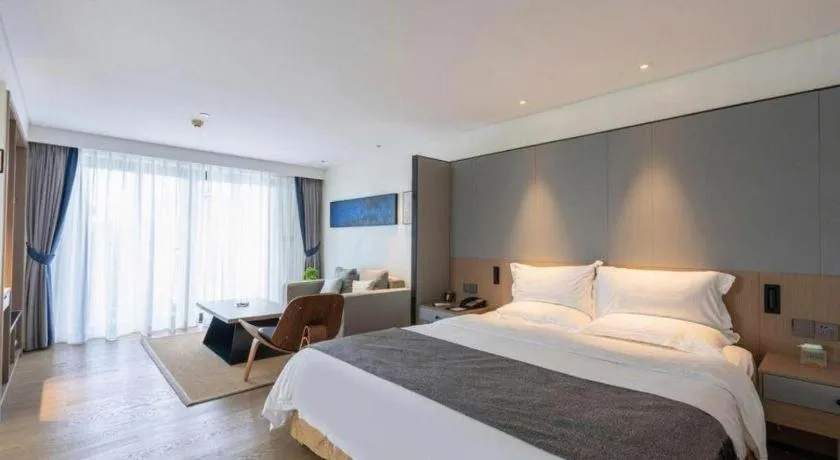 Bed in Zhongshan Louis Hotel